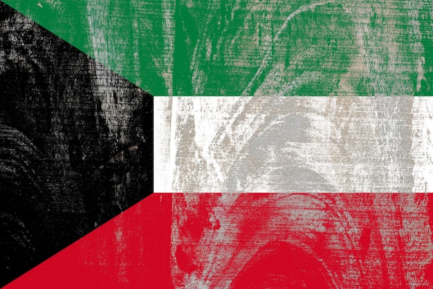 Vlag van Koeweit geschilderd op een beschadigde oude houten achtergrond