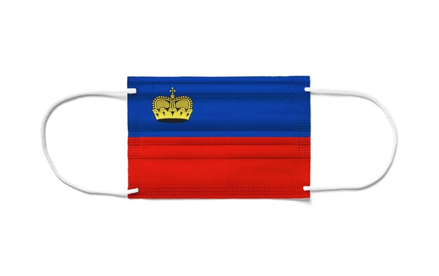 Vlag van Liechtenstein op een chirurgisch wegwerpmasker.