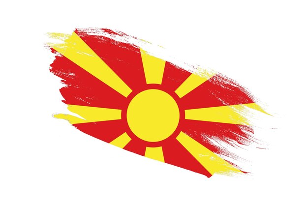 Vlag van Noord-Macedonië met slagpenseel geschilderde effecten op geïsoleerde witte achtergrond