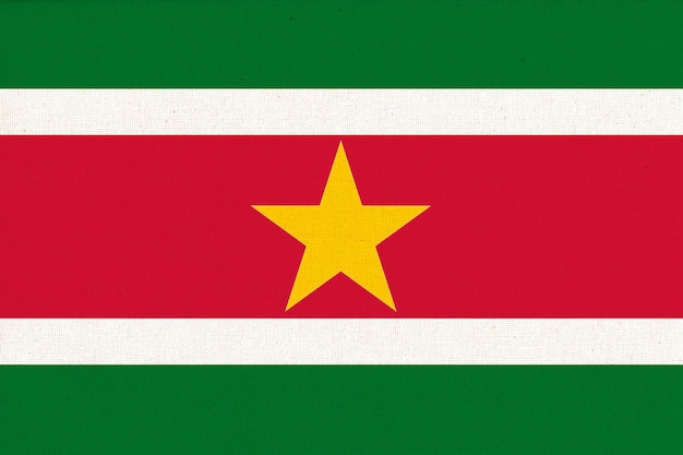 Vlag van Suriname op stof textuur Surinaamse nationale vlag