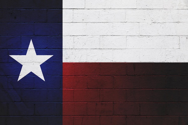 Vlag van Texas geschilderd op een muur van sintelblokken