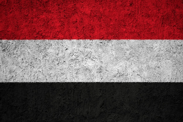 Vlag van Yemen geschilderd op grunge muur