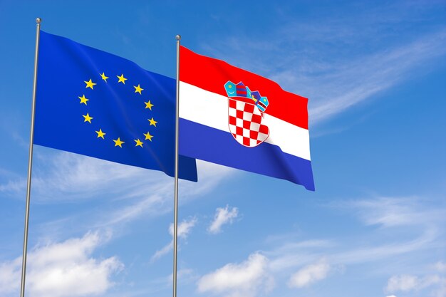 Vlaggen van de Europese Unie en Kroatië over blauwe hemelachtergrond. 3D illustratie