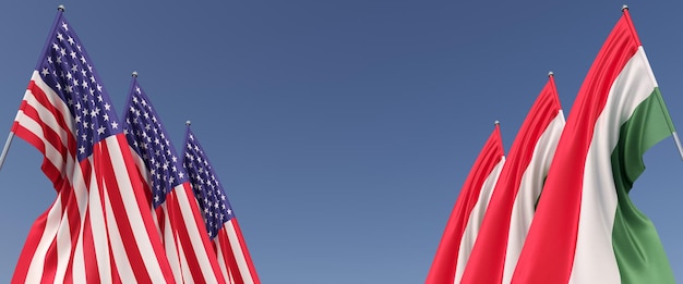 Vlaggen van de Verenigde Staten en Hongarije op vlaggenmasten aan de zijkanten Zes vlaggen op een blauwe achtergrond Plaats voor tekst Verenigde Staten van Amerika Boedapest 3D illustratie