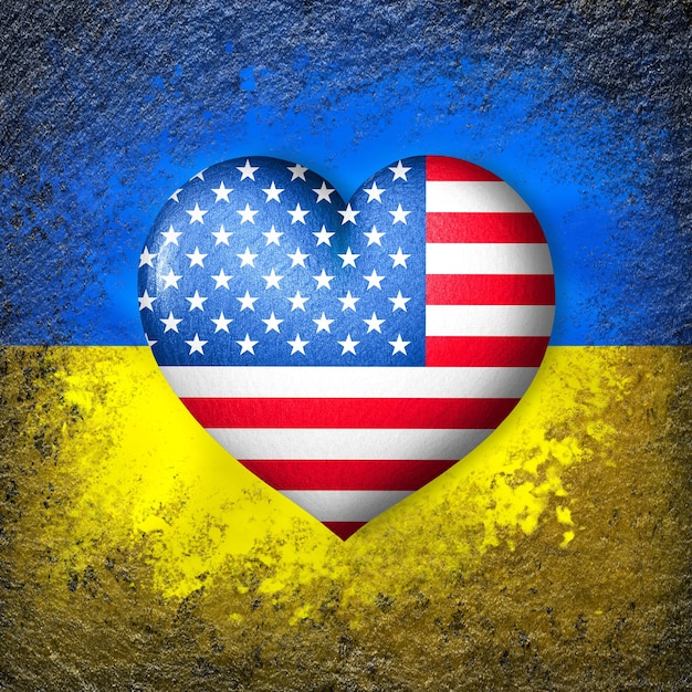 Vlaggen van Oekraïne en de VS Vlag hart op de achtergrond van de vlag van Oekraïne