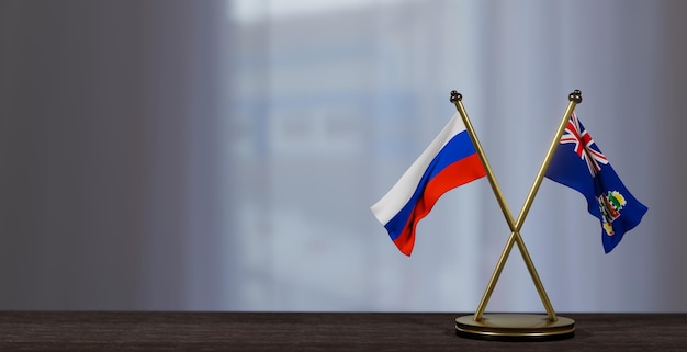 Vlaggen van Rusland en Kaaimaneilanden op tafel Onderhandeling tussen Kaaimaneilanden en Rusland op weinig wazige achtergrond 3D-werk en 3D-beeld