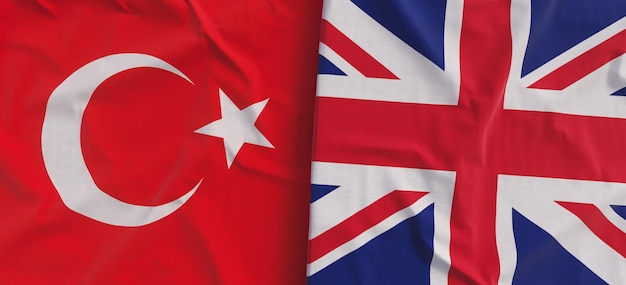 Vlaggen van Turkije en het Verenigd Koninkrijk Linnen vlaggen close-up Vlag gemaakt van canvas Turks Istanbul Groot-Brittannië Staat nationale symbolen 3d illustratie