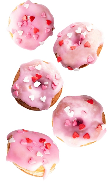 Vliegende zoete donuts geïsoleerd op een witte achtergrond