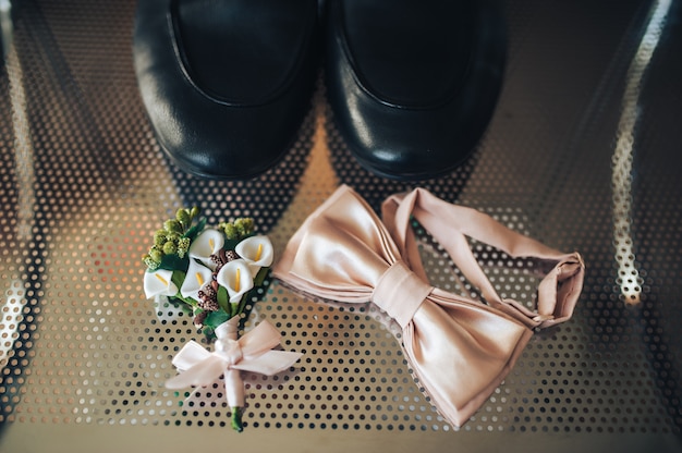 Foto vlinderdas, corsages en schoenen