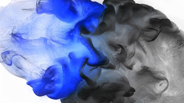 Vloeibare vloeistof kunst abstracte achtergrond Zwart blauwe acrylverf onderwater galactische rook oceaan