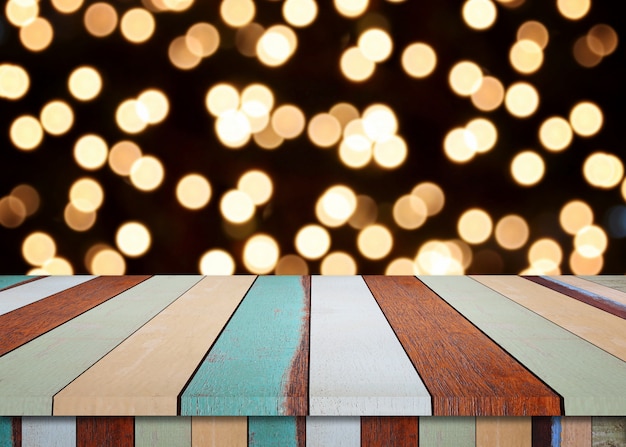 Vloer van houten tafel en kerstmis bokeh achtergrond.