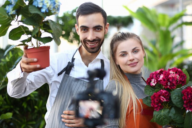 Vlogger Gardener Showing Camera Hortensia Flower