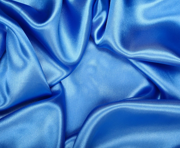 Foto vlotte elegante blauwe zijde als achtergrond