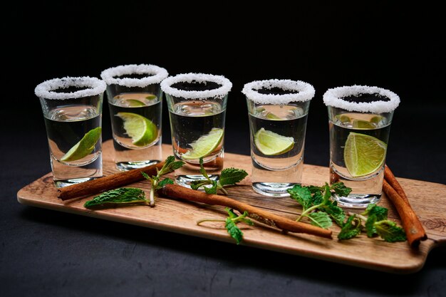 vodka in shot glasses with lime