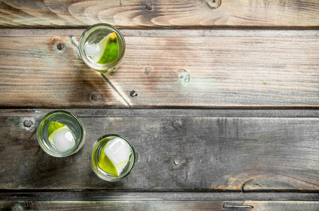 Vodka with lime slices and ice