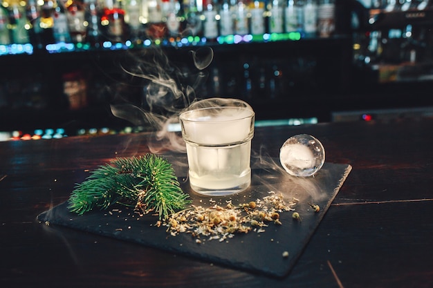 Photo vodka with smoke from liquid nitrogen.