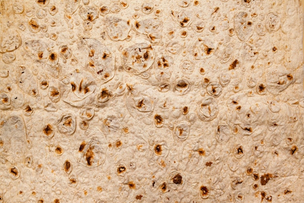 Voedselachtergrond - close-up van dunne lavash gemaakt van tarwemeel