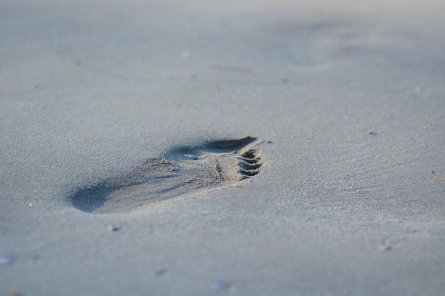 Foto voetafdruk op zand