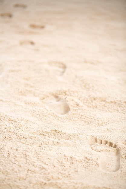 Voetafdrukken op zand