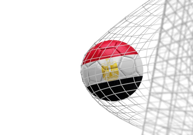 Voetbal met Egyptische vlag scoort een doelpunt in een net