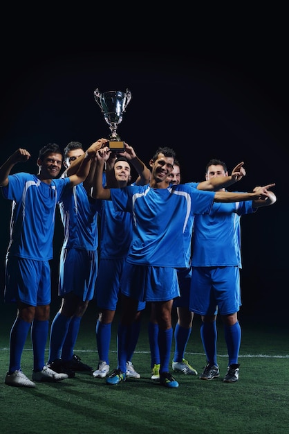 Foto voetbalspelers vieren de overwinning.