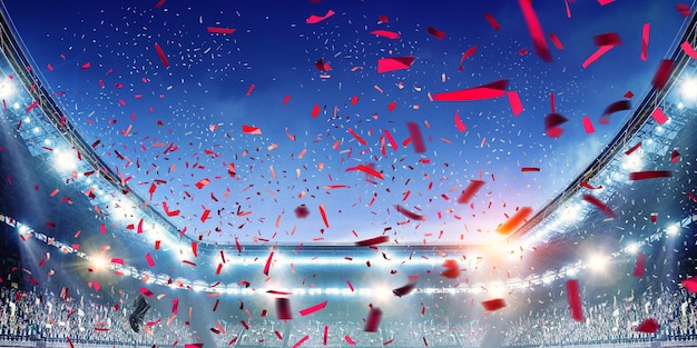 Voetbalstadion achtergrond met vliegende confetti