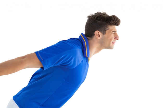 Voetbalster in het blauwe springen van Jersey