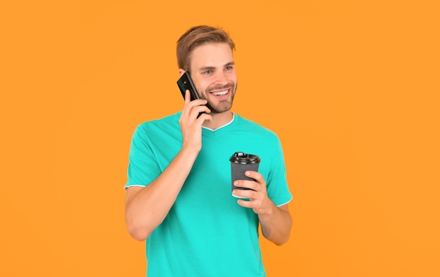 voice contact telephone connection young man talk on cellphone phone call communication mobile technology cheerful man speak on smartphone guy has conversation