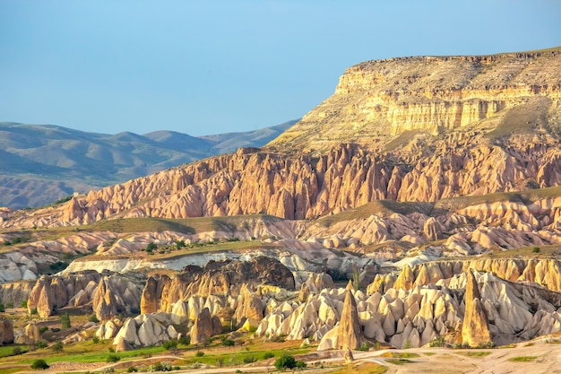 Volcanic rocks and limestone cliffs in Cappadocia valley Turkey