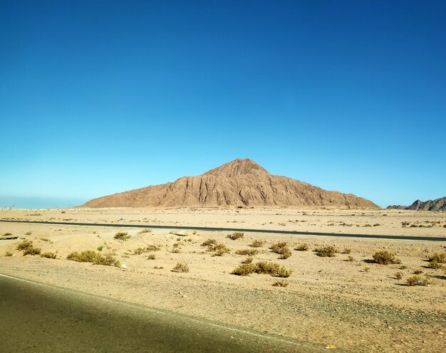 Volcano in the desert and a road