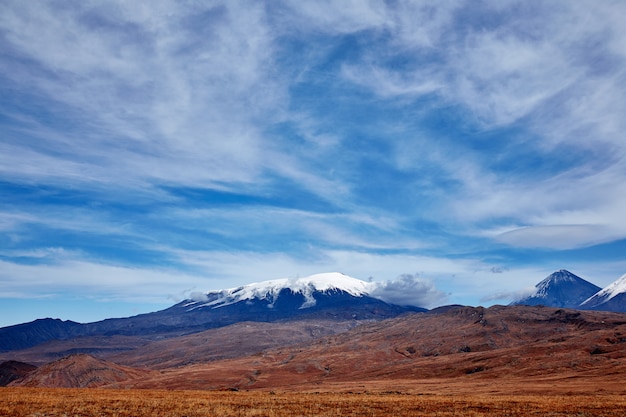 volcano of Kamchatka snow peaks valley