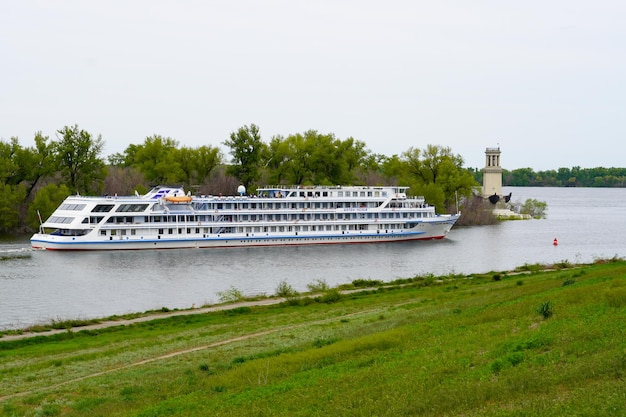 VOLGOGRAD RUSSIA MAY 05 2022 Cruise liner Anton Chekhov with tourists on board passes along the VolgaDon Shipping Canal named after Lenin