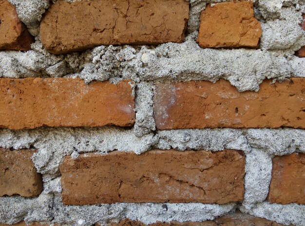 Foto volledige opname van de bakstenen muur