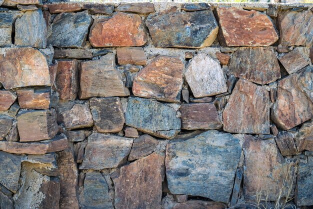 Foto volledige opname van de stenen muur in kleur