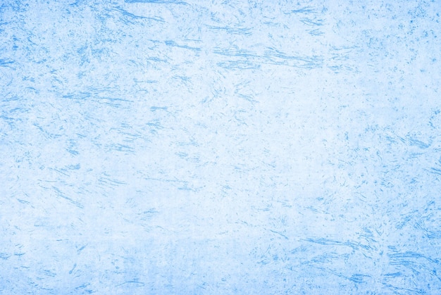 Volledige opname van ijs op blauw oppervlak
