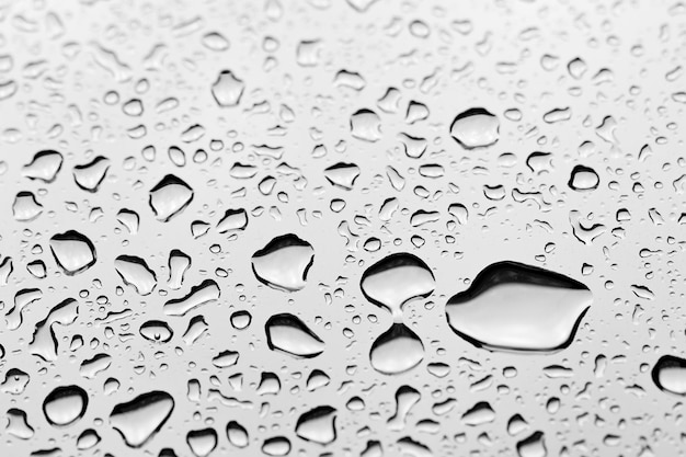 Foto volledige opname van regendruppels op glas