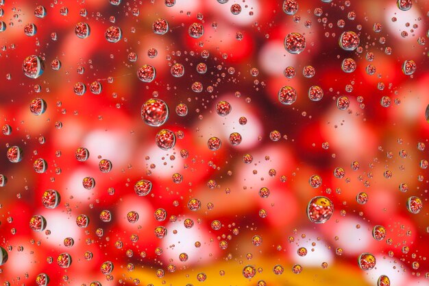 Foto volledige opname van waterdruppels op een glazen raam