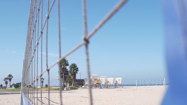 Volley ball net on court for volleyball game on beach\
california coast usa