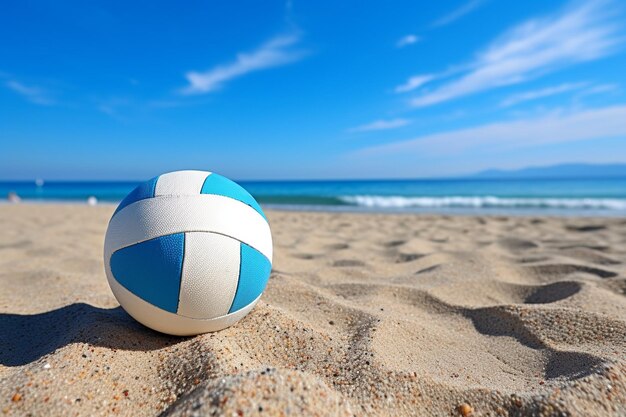 Photo a volleyball on the beach by the sea blue sky background