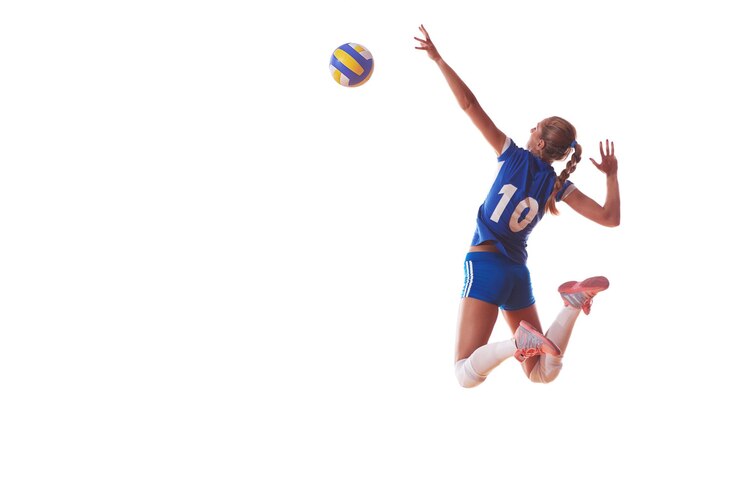 Photo volleyball woman jump and kick ball isolated on white background