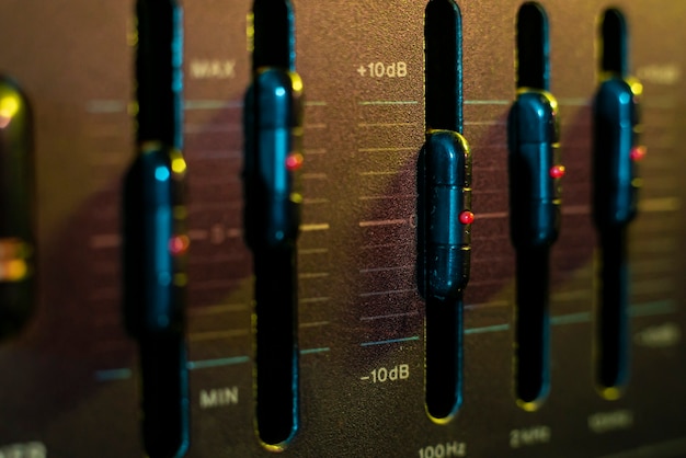 Photo volume and equalizer controller detail in an old stereo equipment