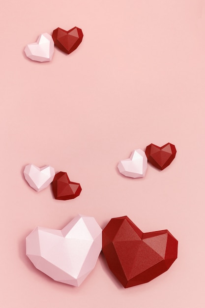 Volumetric paper hearts red and pink colored