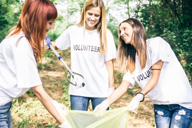 Volunteers cleaning garbage