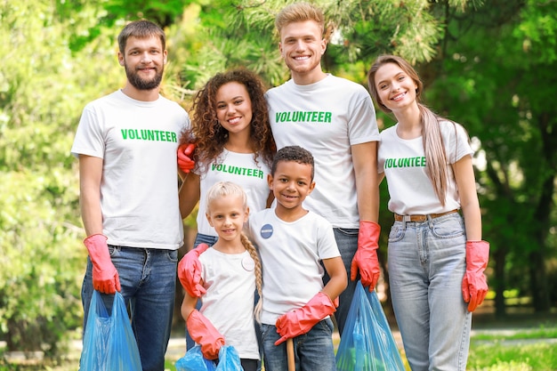 Volunteers gathering garbage in park