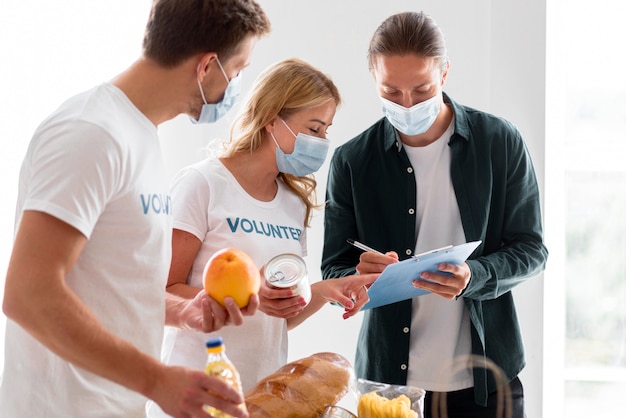 Volunteers helping with donations for food day