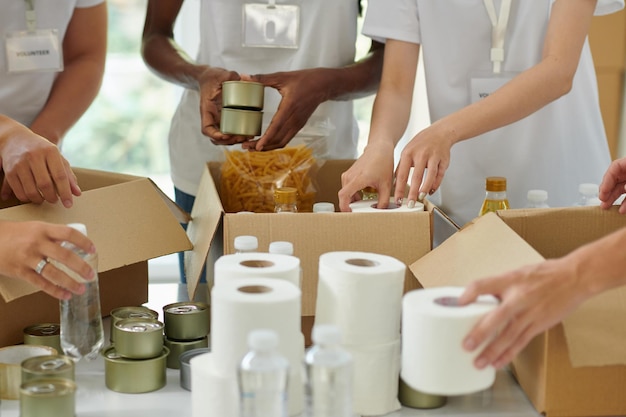 Volunteers packing donated goods