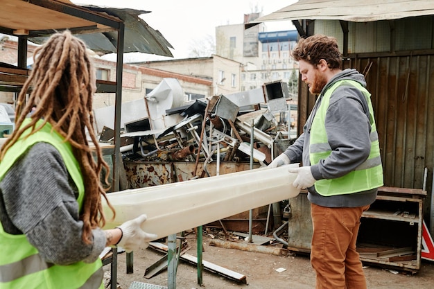 Volunteers Sorting Collected Garbage