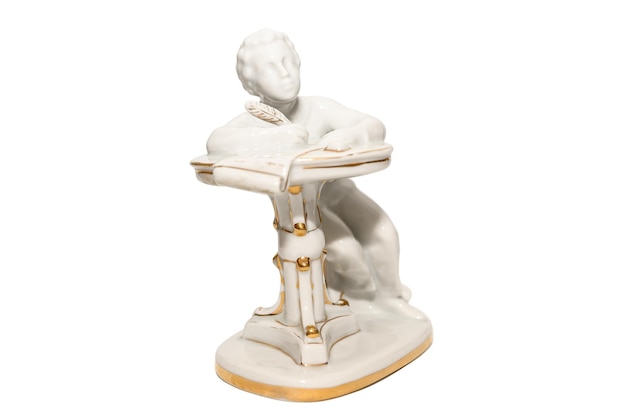 volzhsky russia december 7 2022 figurine ceramic figurine of the young poet pushkin writes poetry