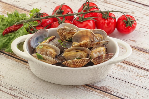 Foto mollusco vongole con burro d'aglio