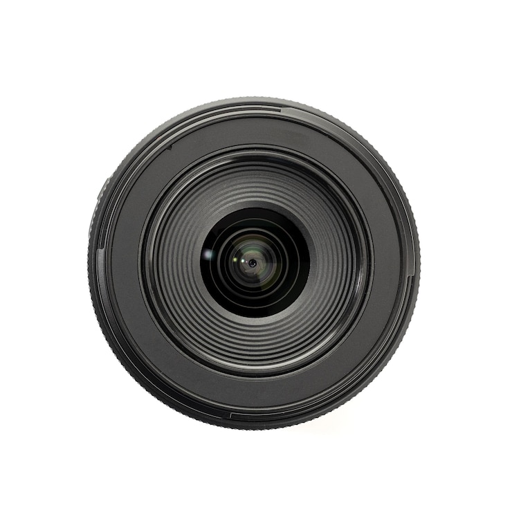 Foto vooraanzicht van een moderne fotocameralens geïsoleerd op witte achtergrond camera oog